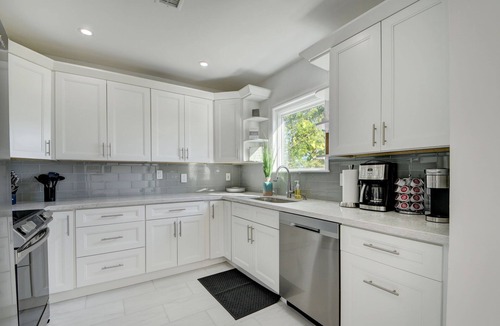 Parrot Cove House | Beautiful Pool home on Golf Course, with Intracoastal views, 1 mile to the Beach