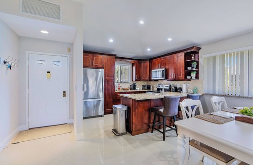 Hunt Club Cottage | Beautifully updated, end unit, waterfront club cottage. 2BR 2BA + Pool and More!