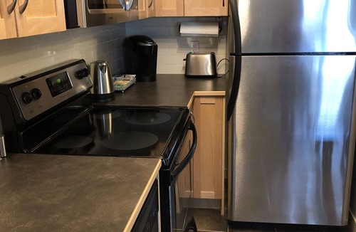 Canmore Condo | Best Relaxing King Bed Suite/Mtn. View, Heated Pool & Hot Tubs & Free Parking