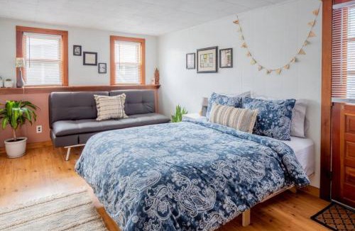 Winooski Falls Mill District Apartment | Bohemian Bungalow with Hot Tub