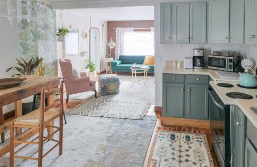 Winooski Falls Mill District Apartment | Bohemian Bungalow with Hot Tub