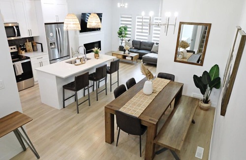 Southwest Edmonton House | BoHo Modern Retreat King Fireplace Disney
