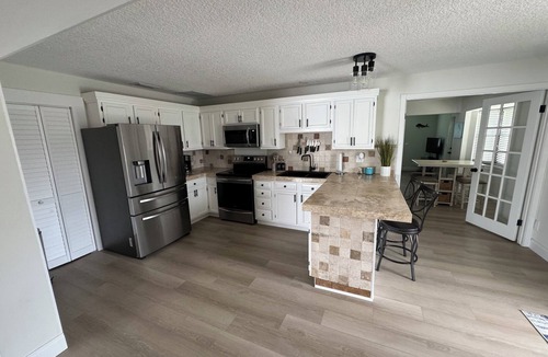 Stuart House | Breezy 4BR w/Golf Clubs + Heated Pool + Tiki Bar