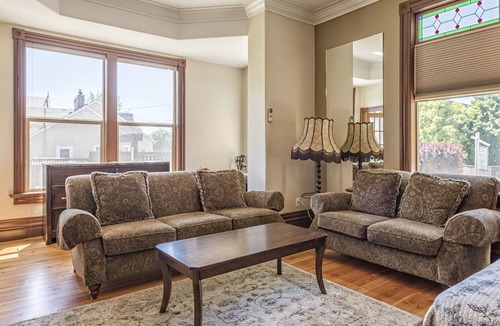 Vernon Apartment | Bright Ground Level Studio Suite is situated in the Historical Carew House