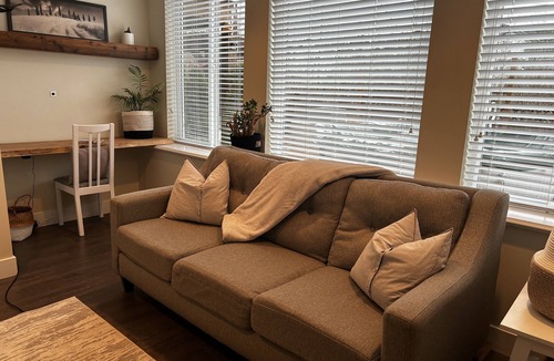 Maple Ridge House | Bright Modern 1 bed suite with garden/pool view.