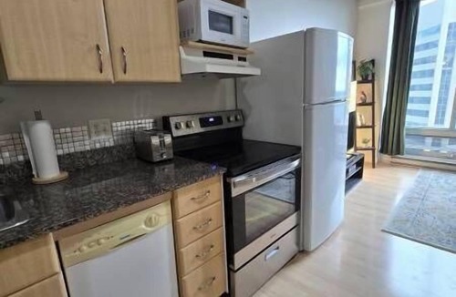 Downtown Edmonton Apartment | Cam - Downtown Loft | Skyline Views near Rogers