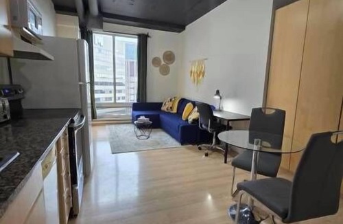 Downtown Edmonton Apartment | Cam - Downtown Loft | Skyline Views near Rogers