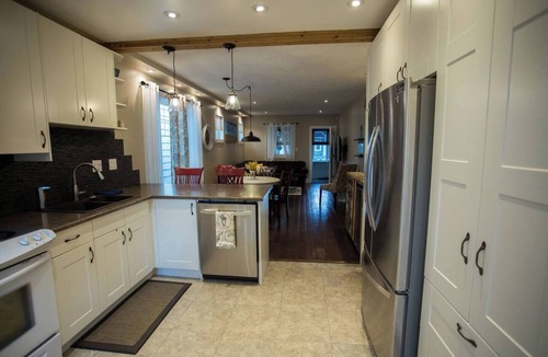 Saskatoon House | Central Home w/Backyard and Garage parking Space close to Broadway and Downtown