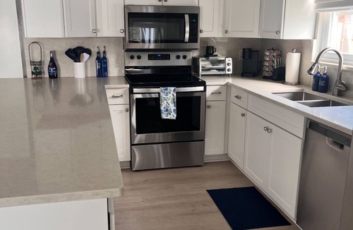 Jupiter Village House | Charming 3-bedroom pool home on the lake with spectacular sunsets & close to all