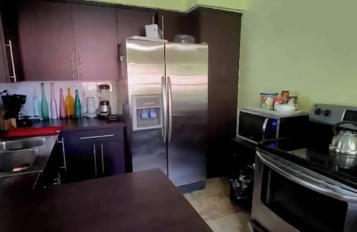 Golden Glades House | Charming centrally located 2-bedroom house with oversized backyard and gazebo.