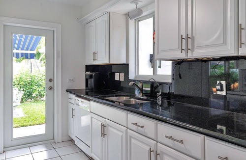 Jog Road House | Charming redone house just minutes from beach…