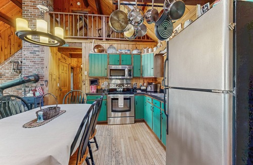 Wiscasset House | Charming riverfront home with cozy interiors, dock, and scenic deck views