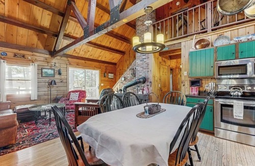 Wiscasset House | Charming riverfront home with cozy interiors, dock, and scenic deck views