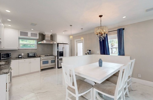 Bel Air House | Cheerful retreat near beaches and nightlife with large patio, dog friendly