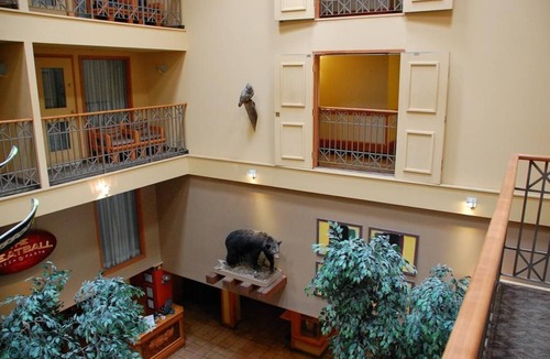Banff Apartment | Chic King Room w/Balcony | Sauna & Hot Tub Access