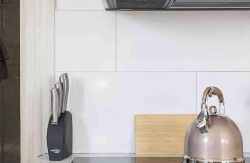 Old North End Apartment | Cityscape Sanctuary: parking+laundry
