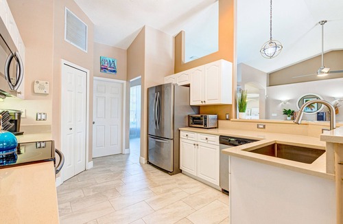 Sebastian Highlands House | Coastal Haven in Sebastian W/Heated Saltwater Pool, BBQ Grills, Fire Pit & Near Beaches!🌴