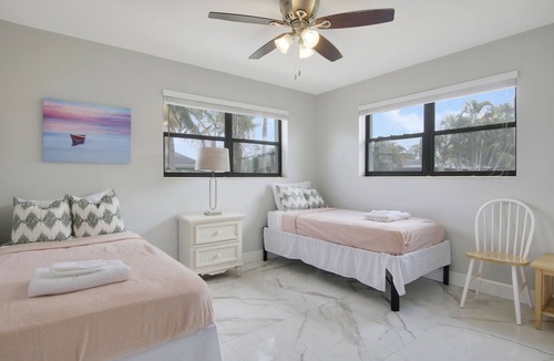 Juno Ridge House | Coastal house in Juno beach with heated saltwater pool. Walk to the local beach.