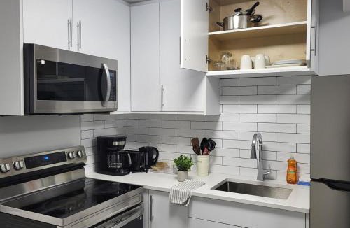 Regina House | Comfortable Two Bed Basement With Free WiFi, Laundry and Private Entry