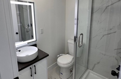 Delta House | Cozy 2-bedroom guest suite available for your vacation.