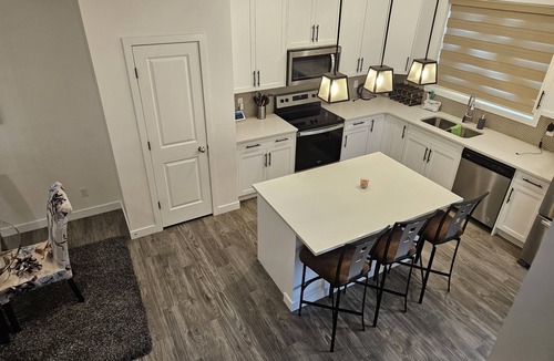 Airdrie House | Cozy 3 Bedroom Home Retreat with a Private Office.