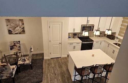 Airdrie House | Cozy 3 Bedroom Home Retreat with a Private Office.