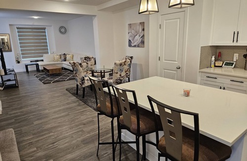 Airdrie House | Cozy 3 Bedroom Home Retreat with a Private Office.