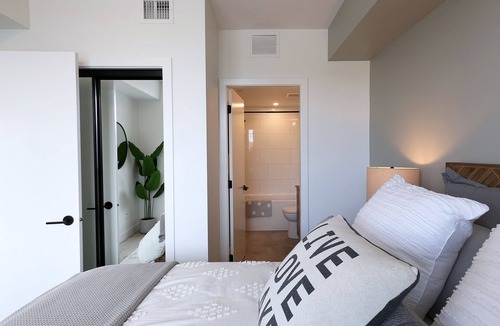 Kelowna Central Business District Condo | Cozy Downtown Suite w/ Stunning Design & Lake View
