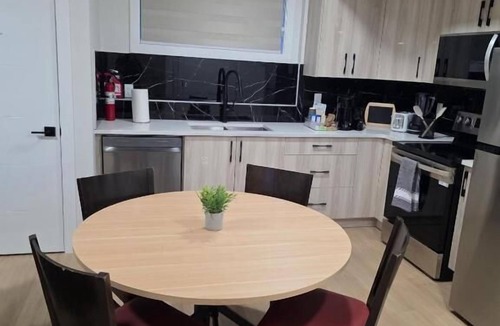 Leduc County Apartment | Cozy Irvine Creek Walk-Out Suite 10 mins to YEG