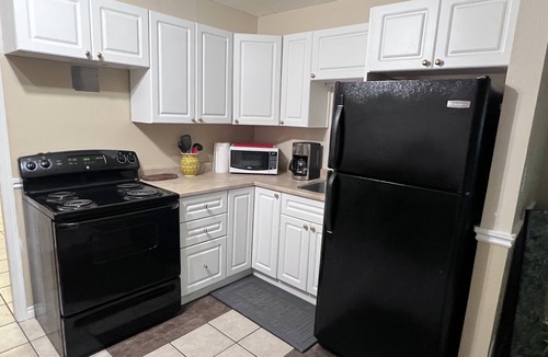 Victoria House | Cozy one bedroom suite with hot tub and pool (summer) access