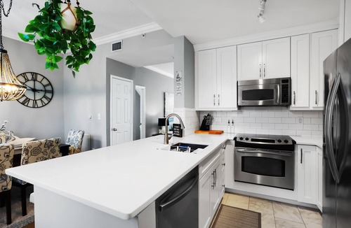 East Ocean Ave House | Cozy orange beachside townhouse with yard, Wi-Fi, & full kitchen in Lantana!