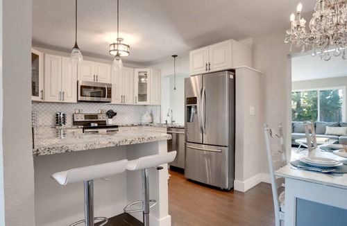 Deerfield Beach House | Cozy Tropical Home w/Heated Pool, Hot Tub & BBQ
