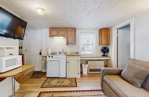 Lincoln Cabin | Cute Riverfront Cabin in Great Location w/Shared Pool, Kitchenette, & Free WiFi