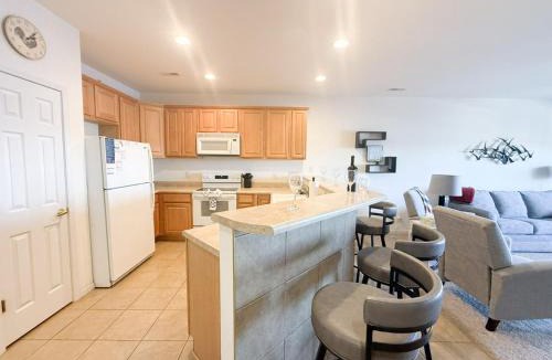 Almont House | Dog Daze Lakefront Condo 3 Bed and 2 Bath
