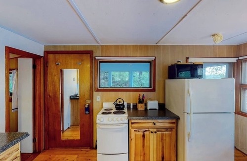 Charlotte Cottage | Dog-friendly bay-front cabin w/screened in porch & great views - next to trails