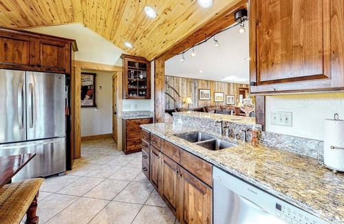 South Fork House | Dog-friendly riverfront retreat with hot tub, stunning views & screened porch