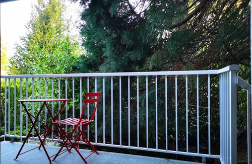 Cordova Bay House | Eagle's guest suits: two bedrooms living room private kitchen and full washroom