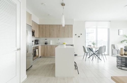 Northeast Miami Apartment | Enjoy a panoramic view of the pool and Miami’s stunning sunsets This.