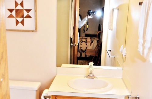 Grantham Condo | Enjoy beautiful water views and water access to West Cove from this light-filled condo