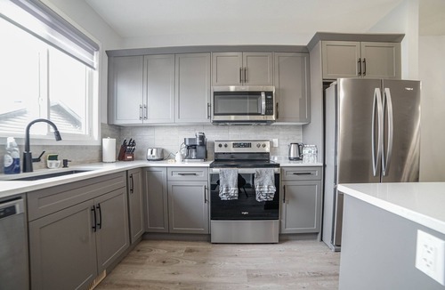 Southeast Calgary House | Family Home with Office and Private Yard