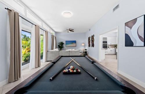 West Palm Beach House | Family retreat wheated pool game room