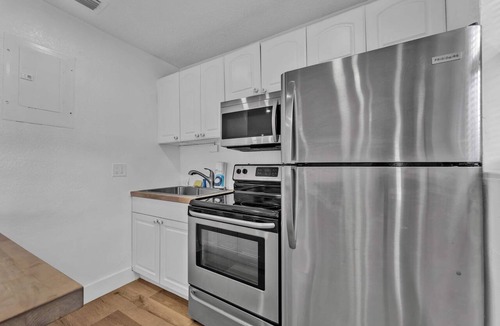 Sailboat Bend Condo | Flamingo Escape: Bright 2BR Near Riverside Beach