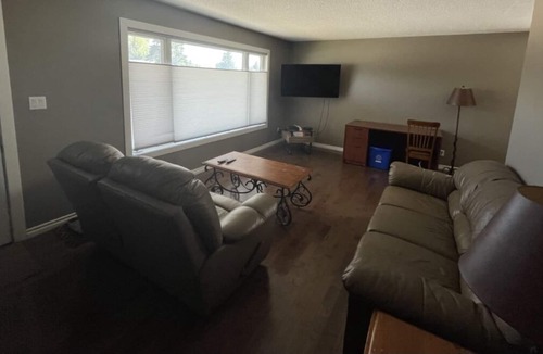 Kindersley House | Furnished 4 bedroom home in Kindersley