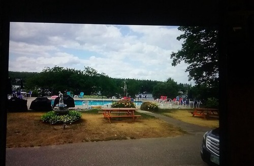 Laconia Resort | Great location with lake views ,pool and private beach.