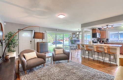 East Colfax House | Grey Brick Home Close to Central Park & Anschutz Medical Campus