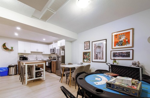West Edmonton House | Group Oasis near WEM | Hot Tub, 2 Kitchens, 3 Lounges, Fire Table Sleeps 14
