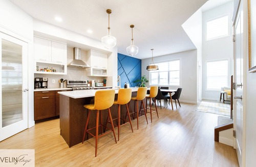 West Edmonton House | Group Oasis near WEM | Hot Tub, 2 Kitchens, 3 Lounges, Fire Table Sleeps 14