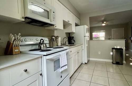 Palm Beach Shores Apartment | "Haven": Pool, Free Bikes & Walk to the Beach
