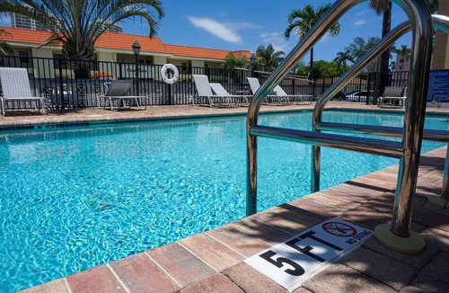 Palm Beach Shores Apartment | "Haven": Pool, Free Bikes & Walk to the Beach