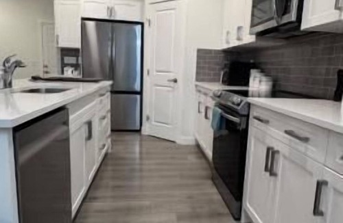 Cochrane House | Heartland Nest - Brand New 2BR house with Garage, AC, BBQ